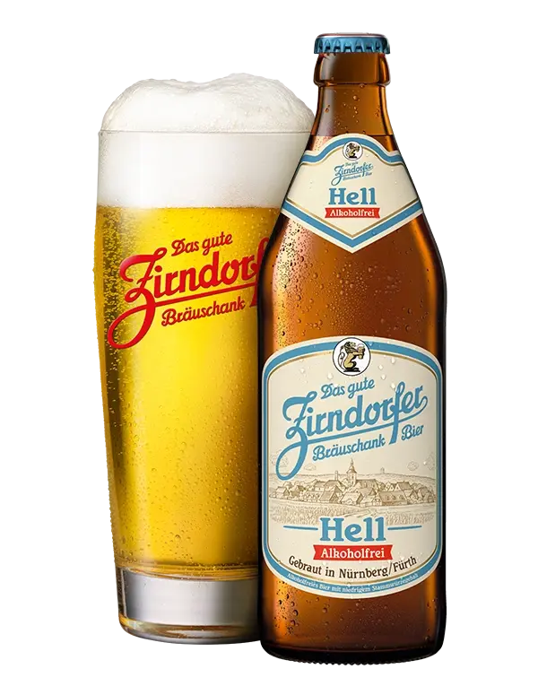 Neben einer Bierflasche Zirndorfer Hell Alkoholfrei steht ein Zirndorfer-Glas, gefüllt mit Bier.